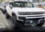 GM Scales Back EV Production; UAW Victory Challenged by Ford Battery JV